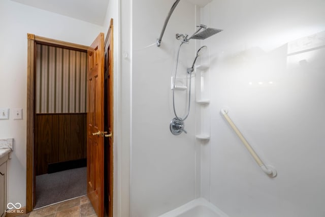 bathroom with vanity and walk in shower