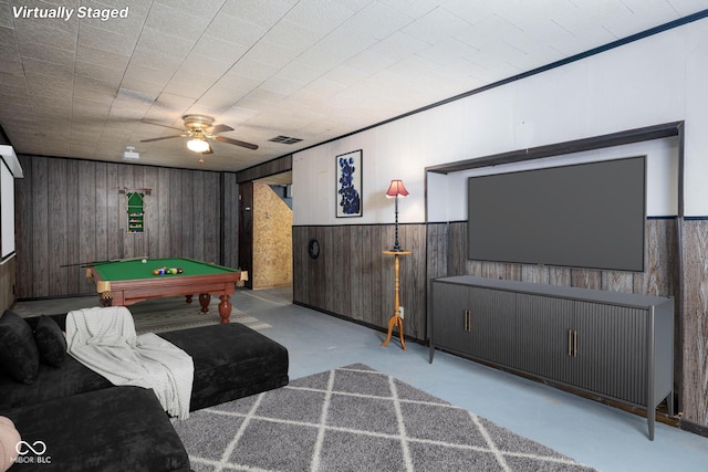 rec room featuring ceiling fan, wooden walls, and pool table