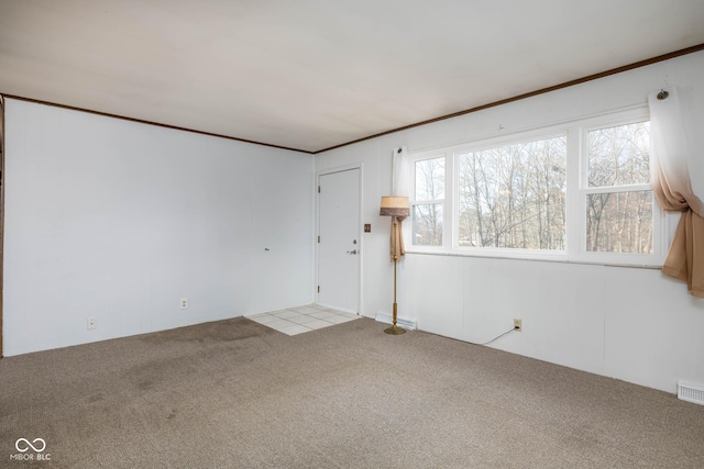 unfurnished room featuring light colored carpet