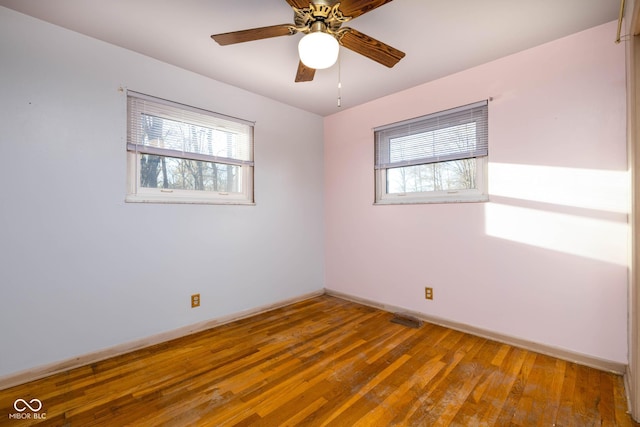 unfurnished room featuring wood-type flooring and ceiling fan