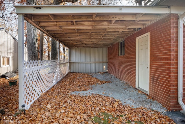 exterior space with a carport