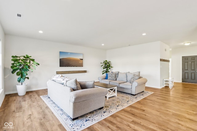 living room featuring light hardwood / wood-style flooring