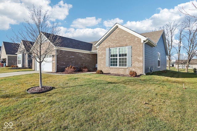 view of front of house with a garage and a front yard