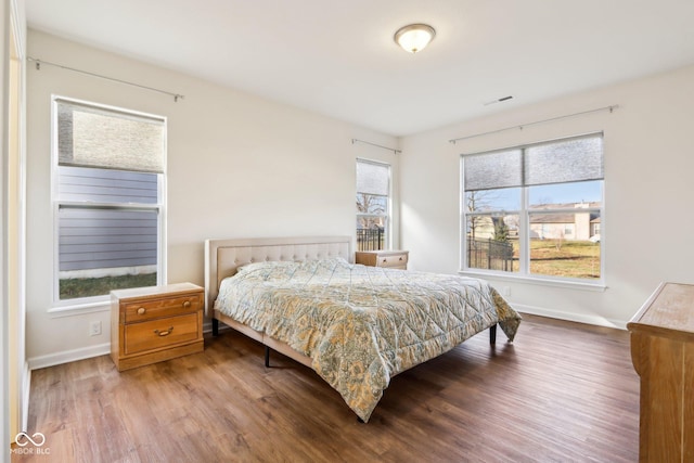 bedroom with hardwood / wood-style floors