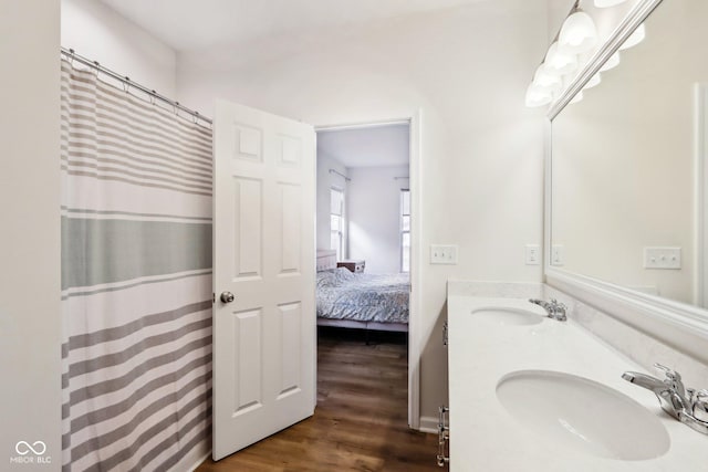 bathroom featuring vanity and wood-type flooring