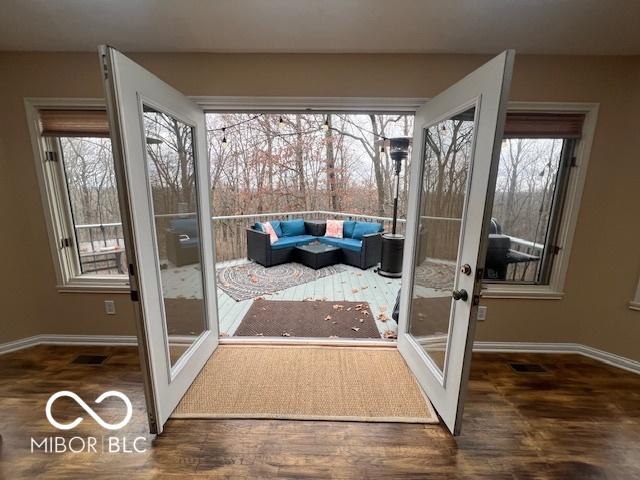 entryway with french doors and a healthy amount of sunlight