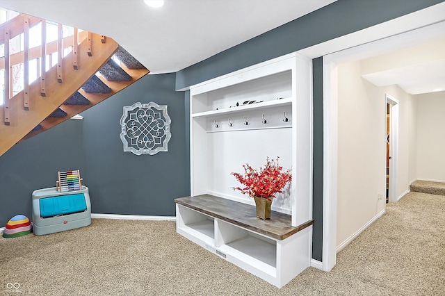 mudroom featuring carpet