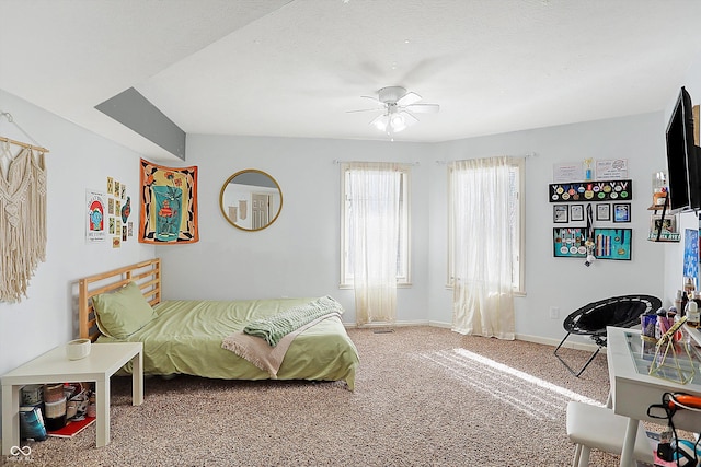 bedroom with ceiling fan and carpet