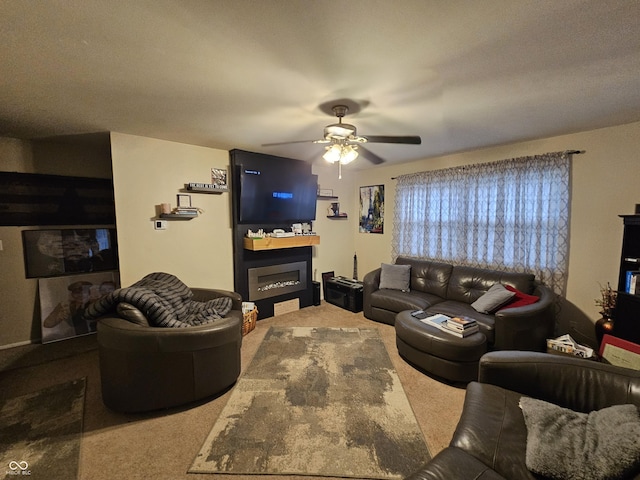 carpeted living room featuring ceiling fan