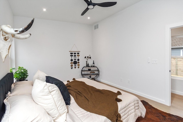 bedroom featuring ceiling fan and wood-type flooring