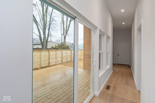 hall featuring light hardwood / wood-style flooring