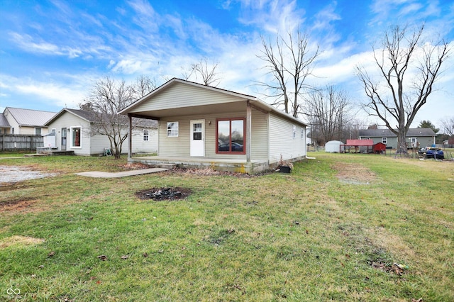 view of front of home with a front lawn