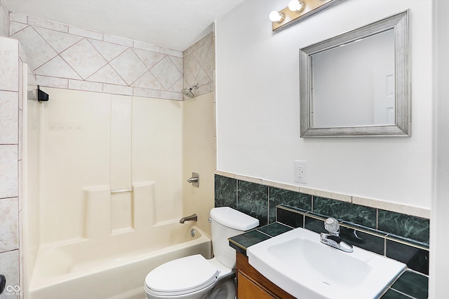 full bathroom featuring vanity, toilet, shower / tub combination, and tile walls