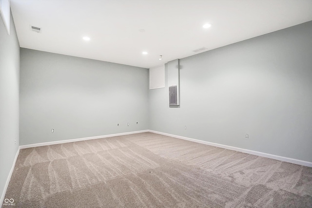 unfurnished room with carpet flooring and electric panel