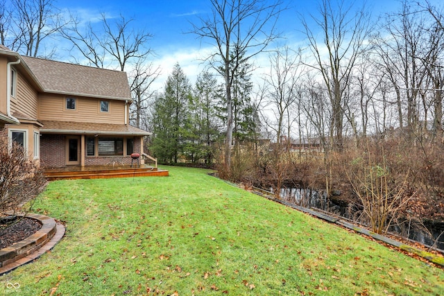 view of yard featuring a deck