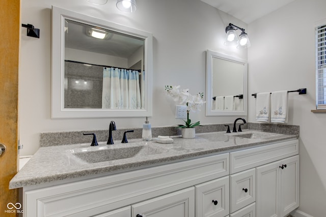 bathroom with vanity and walk in shower