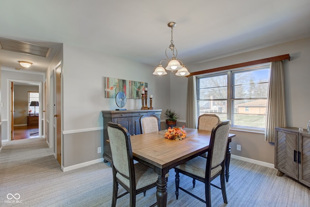 view of carpeted dining space