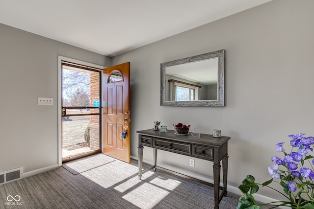 entryway with carpet