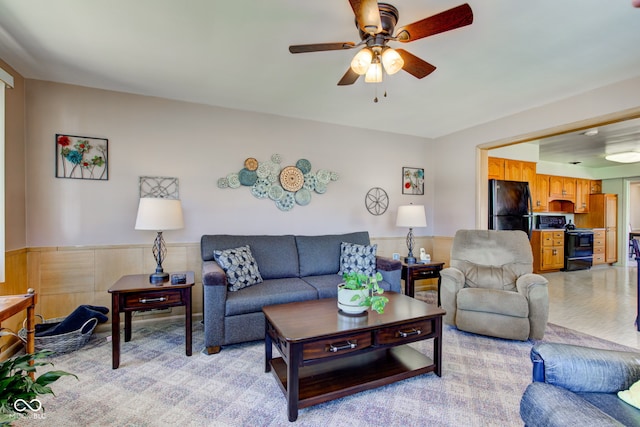 living room featuring ceiling fan