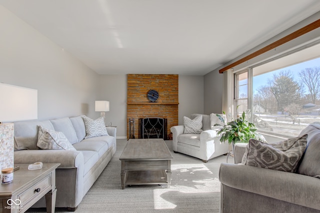 living room featuring a fireplace