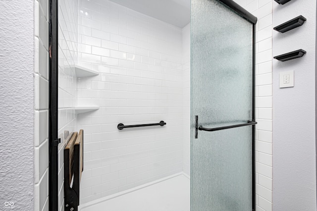 bathroom with an enclosed shower