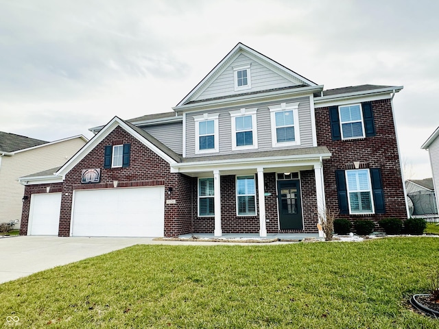 view of front facade with a garage and a front lawn