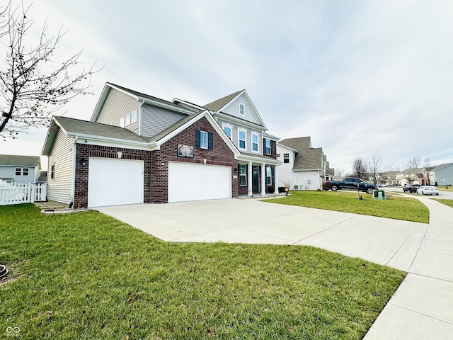 view of front of home with a front yard and a garage