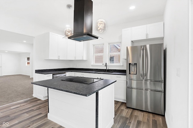 kitchen with pendant lighting, sink, appliances with stainless steel finishes, island range hood, and white cabinetry