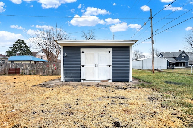 view of outdoor structure with a yard