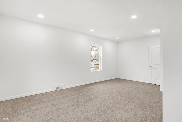 unfurnished room featuring carpet floors