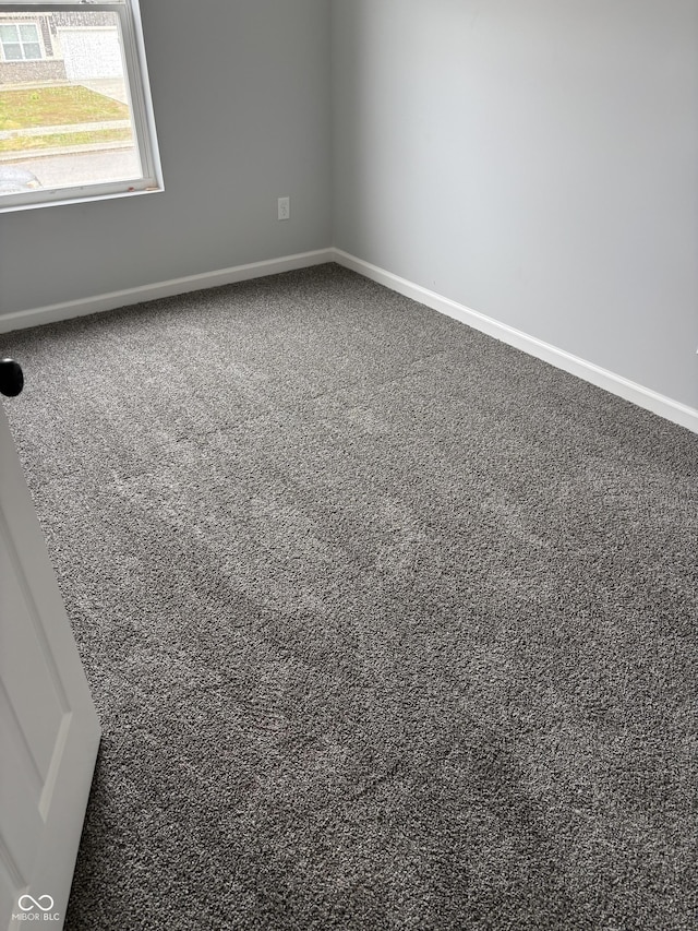 1433 Wigwam Ln, Martinsville, IN 46151 - spare room with carpet and baseboards