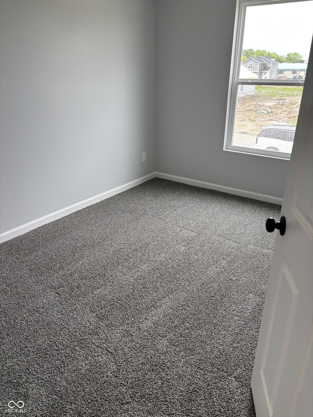 1433 Wigwam Ln, Martinsville, IN 46151 - carpeted empty room with baseboards