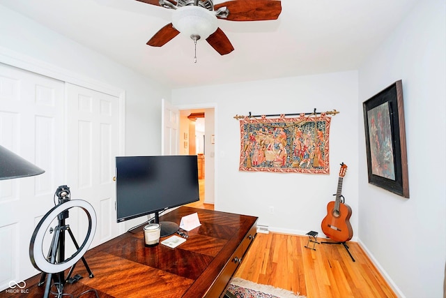 office space featuring hardwood / wood-style floors and ceiling fan