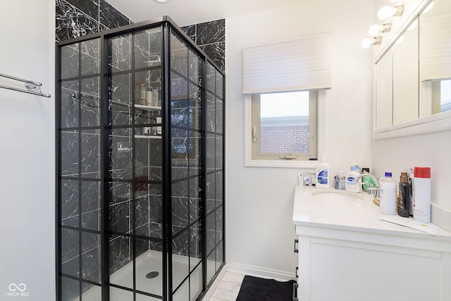 bathroom with tile patterned floors, vanity, and a shower with shower door