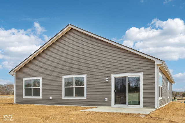 rear view of house featuring a patio area