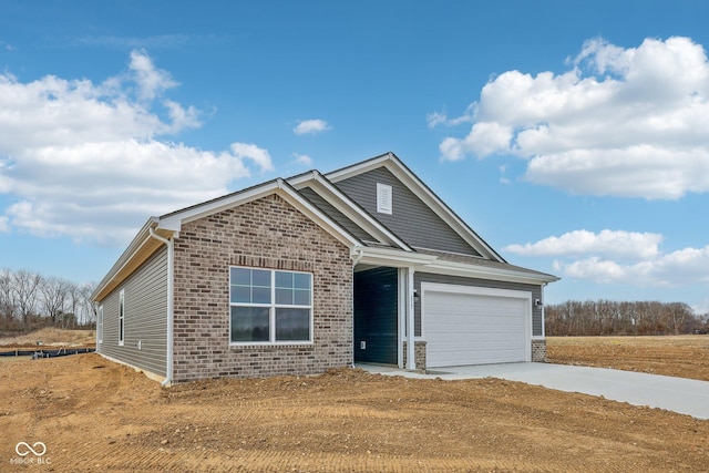 ranch-style home featuring brick siding and driveway