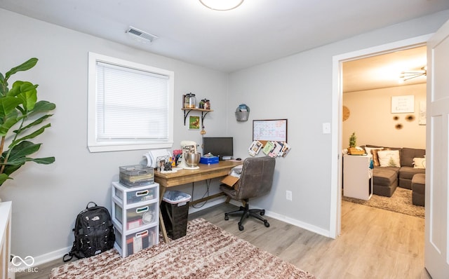 office space featuring light hardwood / wood-style flooring