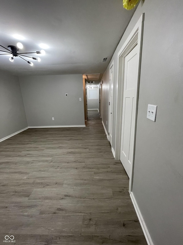 corridor with dark wood-type flooring