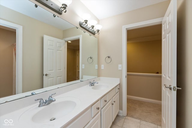 bathroom with tile patterned flooring and vanity