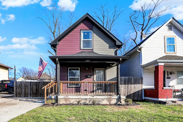 front facade featuring a front lawn and a porch