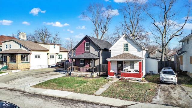 view of front of house with a front lawn and covered porch