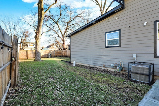 view of yard featuring central AC unit