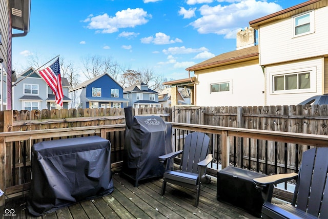 wooden terrace with grilling area