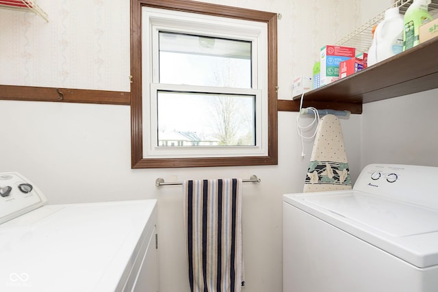 washroom with independent washer and dryer