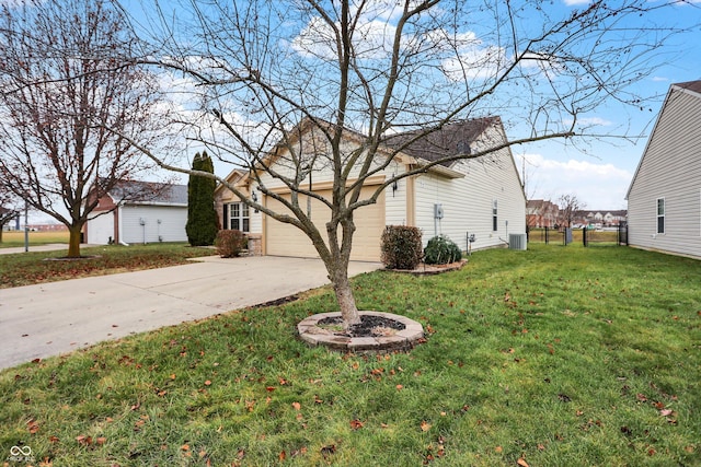 view of home's exterior with central AC unit, a garage, and a yard