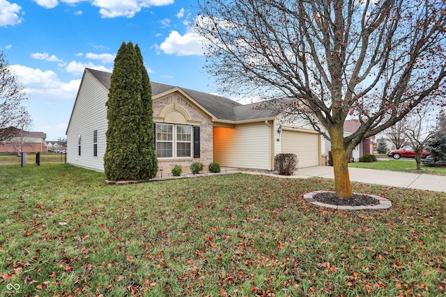 ranch-style home with a garage and a front yard