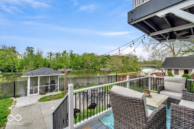 2222 E 75th St, Indianapolis, IN 46240 - wooden deck with a sunroom, a water view, and a fenced backyard