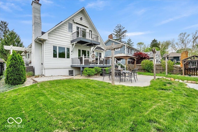 2222 E 75th St, Indianapolis, IN 46240 - rear view of property featuring a balcony, a chimney, a patio area, and a gazebo