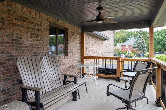 view of patio featuring ceiling fan and a wooden deck