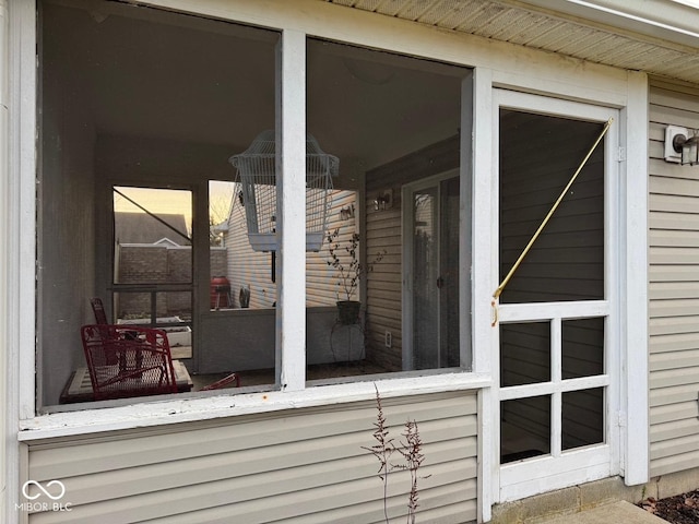 deck with a sunroom